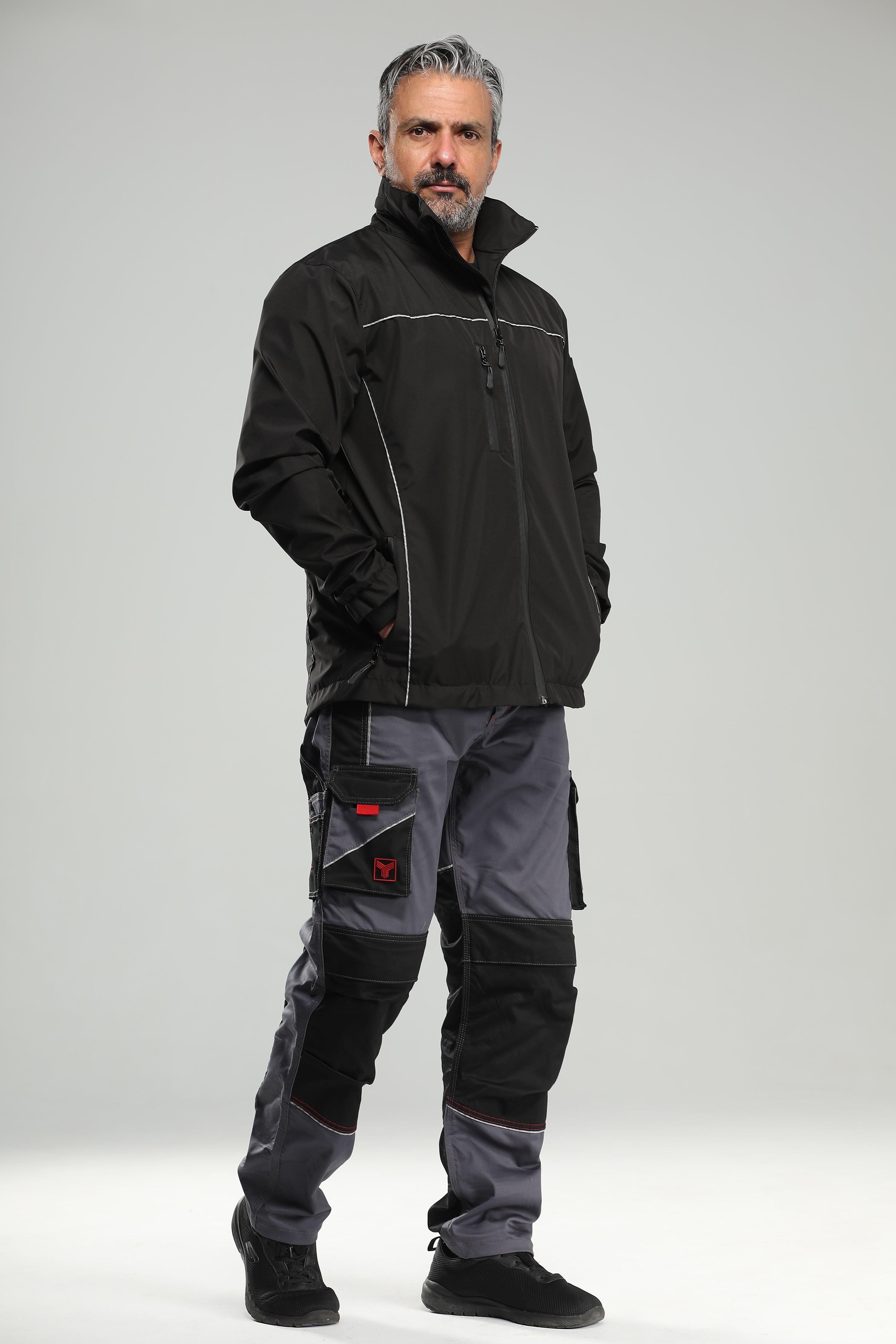 Black rain jacket with reflective piping